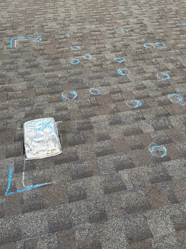 Roof surface showing signs of possible hail damage