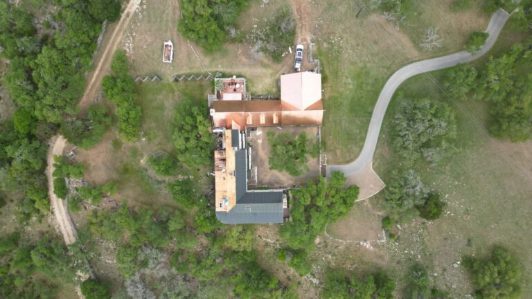 Copper standing seam roof installed by Next Gen Roofing & Construction