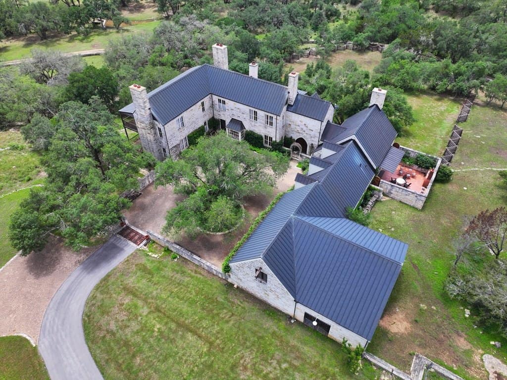 Copper standing seam roof installed by Next Gen Roofing & Construction