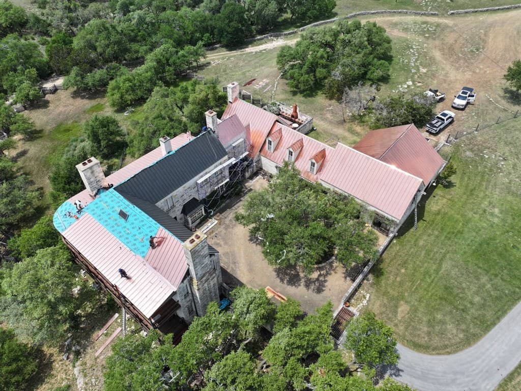 Copper standing seam roof installed by Next Gen Roofing & Construction