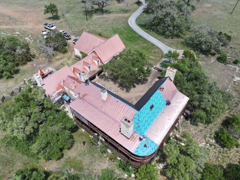 Copper standing seam roof installed by Next Gen Roofing & Construction