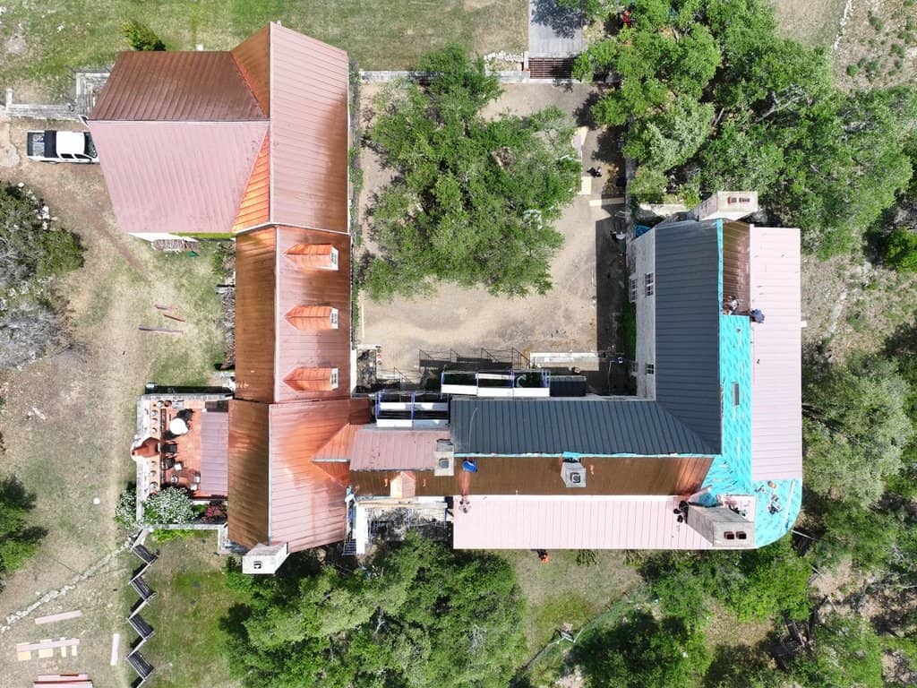 Copper standing seam roof installed by Next Gen Roofing & Construction
