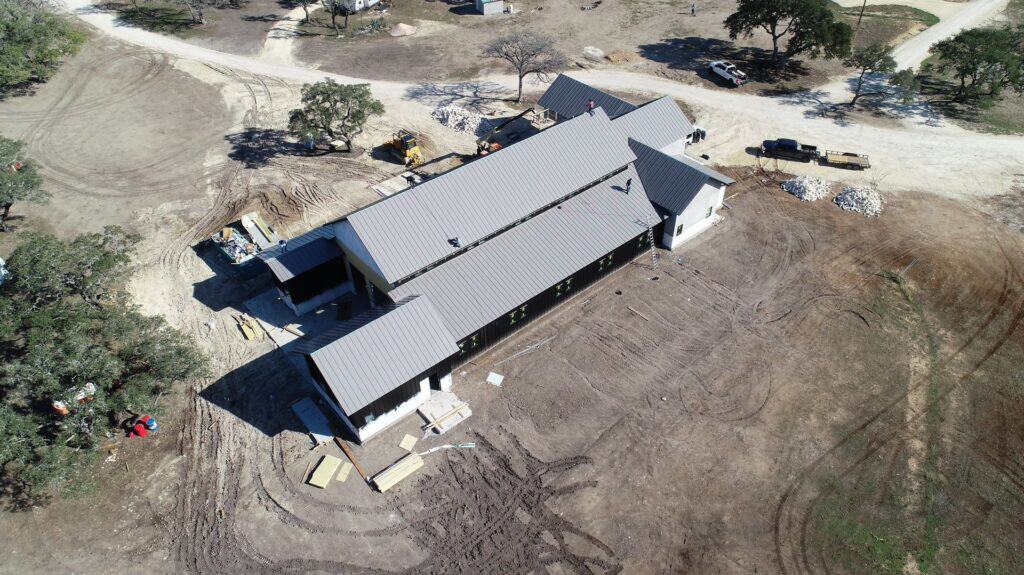Standing seam metal roof installed by Next Gen Roofing & Construction in Central Texas