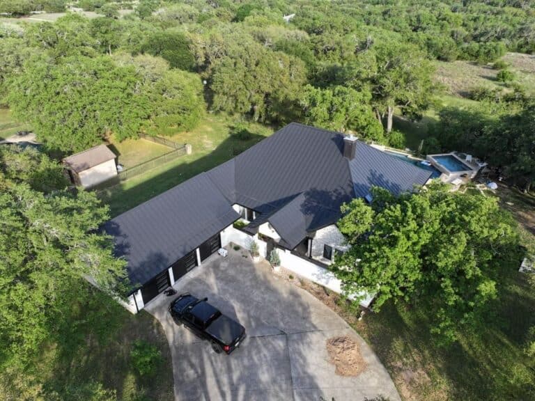 Standing seam metal roof installed by Next Gen Roofing & Construction on a Texas Hill Country home