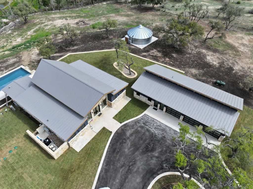Standing seam metal roof installed by Next Gen Roofing & Construction on a Texas Hill Country home