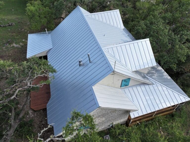 Standing seam metal roof installed by Next Gen Roofing & Construction on a Texas Hill Country home