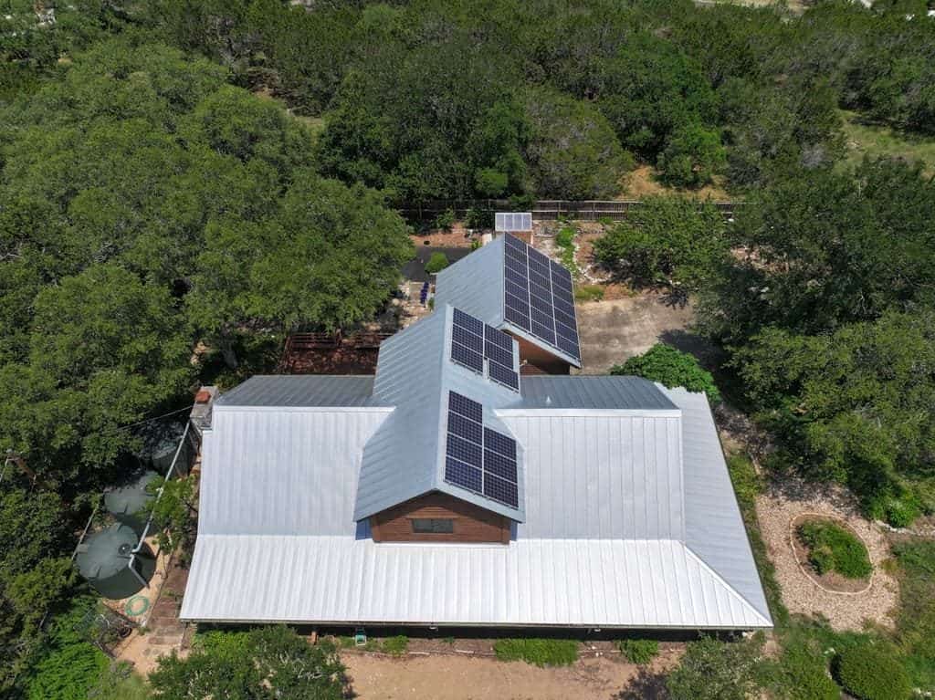Standing seam metal roof installed by Next Gen Roofing & Construction on a Texas Hill Country home