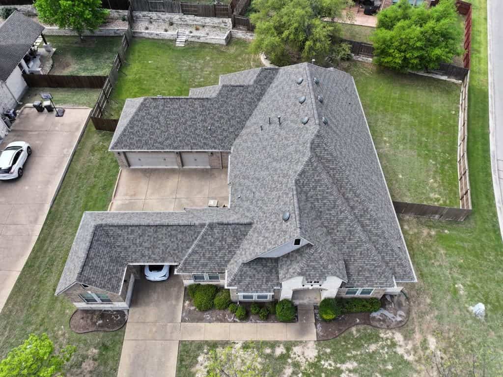 Architectural asphalt shingle roof replacement completed by Next Gen Roofing & Construction in the Austin area